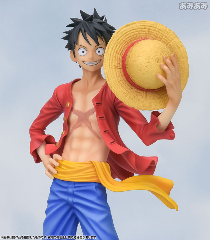 Luffy, one piece hero, smiling under the sun with his straw hat